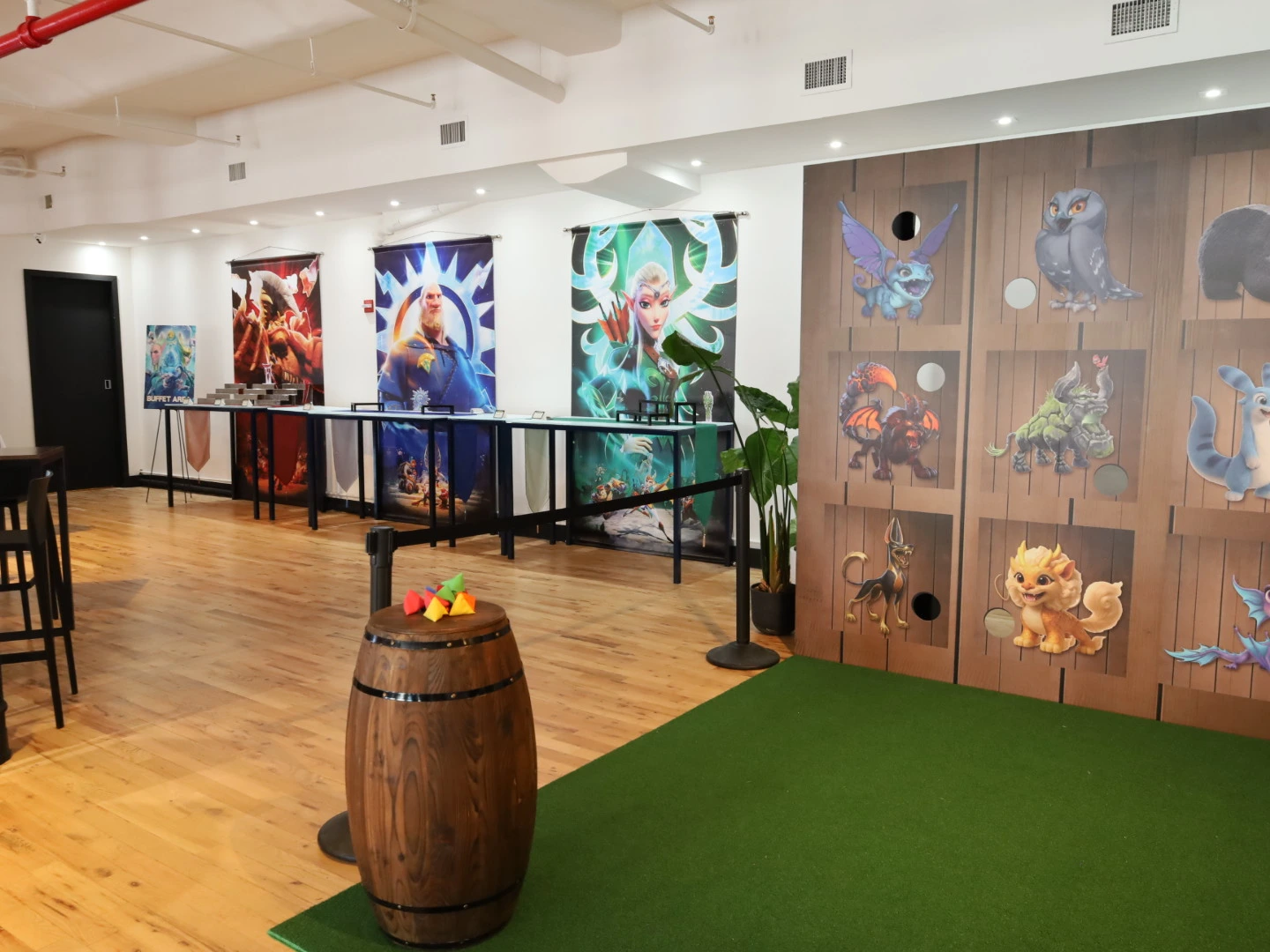 A brightly lit room featuring colorful banners and cartoon characters on display.